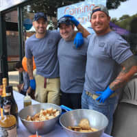 <p>Jeremy, David and Doug Nevins stand in front of their  new business in Mount Kisco. The brothers are reviving an old-school market started by their great-grandfather.</p>