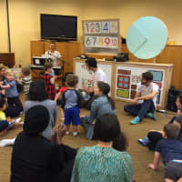 <p>Songs for Seeds holding a concert/class for young children and their parents.</p>