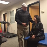 <p>Stanley L. Alpert talks to Shelley Karben-Goldman at Stern Physical Rehabilitation in Monsey.</p>