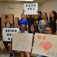 <p>Ten students attended Monday&#x27;s Board of Education meeting to pledge their support in saving the high school&#x27;s American Sign Language program.</p>