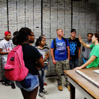 <p>Students are given a tour of the core repository at Lamont-Doherty Earth Observatory, which houses thousands of core samples.</p>