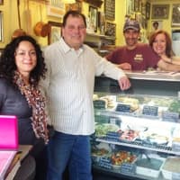 <p>Alex Evans, left, who guides the Suffern Chamber of Commerce&#x27;s social media campaign, stands with Chamber president Aury Licata, center, and Cynthia Gray and Michael Narciso, owners of Mia&#x27;s Kitchen, a village restaurant.</p>