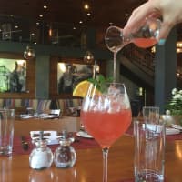 <p>White wine peach sangria at Armonk&#x27;s Moderne Barn is a summer-only cocktail.</p>
