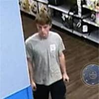 <p>Police are continuing to search for a man accused of committing a lewd act in front of a woman in a Long Island Walmart.</p>