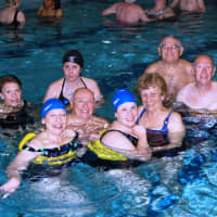 <p>NCJW volunteers and swimmers (individuals with multiple sclerosis) take part in therapeutic exercise in the JCC pool.</p>