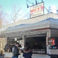 <p>The Filling Station in Palisades, plunked down in a wooded strip of Route 9, has been compared to eateries in the Hamptons.</p>