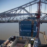 <p>The blue jump forms provide a safe space for construction crews to work on the towers of the new Tappan Zee Bridge. This photo was taken in February.</p>
