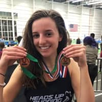 <p>Tess Stapleton of Southport won two medals, including gold in the long jump, at the USA Hershey National Youth Indoor track and field championships.</p>