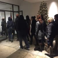 <p>Shoppers walk in as the doors open at 5 p.m. Thursday at Lord &amp; Taylor in Stamford as they take advantage of sales on the holiday weekend.</p>