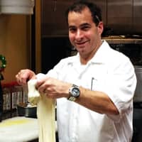 <p>Todd Ledo makes fresh mozzarella – one of the fresh features of Terrace Street Cafe in Haworth.</p>