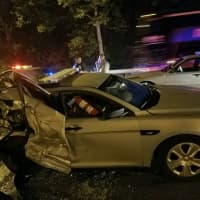 <p>The driver of a tow truck intentionally crashed into this unoccupied Connecticut State Police cruiser on the median of I-95 in Greenwich during a police chase.</p>