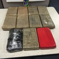 <p>State Police seized about 28 pounds of heroin in a bust on the Merritt Parkway in Stratford.</p>