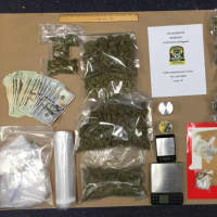<p>On South Exit 1 in Bridgeport on Tuesday at around midnight, a Trooper charged a Norwalk man with drug paraphernalia, possession with intent to sell, possession of a controlled substance and other charges.</p>