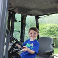 <p>A student at Pocantico Hills School gets behind the wheel of a big rig for &quot;Truck Day.&quot;</p>