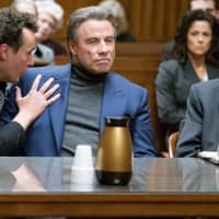 <p>Chris Kerson, a native of Larchmont, left, playing Willie Boy Johnson in a courtroom scene with John Travolta in the new movie, &quot;Gotti.&quot;</p>