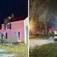 Flames Shoot Out Of Chimney At Bedford Home