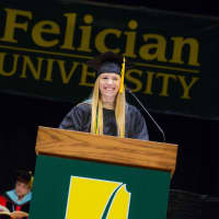 <p>Julia Sheridan addresses her fellow graduates at Felician’s 52nd annual commencement ceremony.</p>