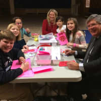 <p>Kids and adults at United Methodist Church of New Canaan make Valentines for seniors during a Sunday School class.</p>