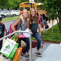 <p>Two girls enter Valhalla High School to begin the 2016-17 school year.</p>