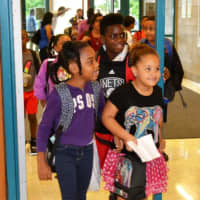 <p>Students arrive at Kensico Elementary School to begin the school year.</p>