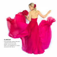 <p>Violeta Velickaite, who worked in the fashion industry for many years, has a little fun making a rosy red dress look like a heart.</p>