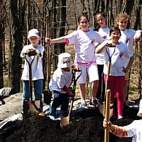 <p>Family Volunteer Day brought out lots of helpers in 2015.</p>