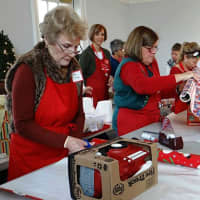 <p>Volunteers also wrapped the gifts after shoppers selected their kids&#x27; gifts.</p>