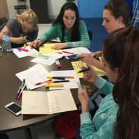 <p>Students from Westlake High create handmade cards for 8-year-old Safyre. </p>