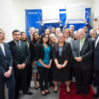 <p>Graduate students in the inaugural class of the MBA in Management program at Berkeley College in the new School of Graduate Studies celebrate with college President Michael J. Smith</p>