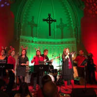 <p>Singer-songwriter Sloan Wainwright, right front, performs with the Sloan Flakes and her band at last year&#x27;s holiday shin-dig in Bedford. The annual concert is set for Saturday, Dec. 10.</p>