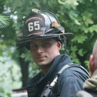 <p>Mike Kronick is one of two local firefighters off fighting fires out West.</p>