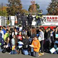 <p>Westside Middle students team up with the Danbury Fire Department to conduct engineering experiments.</p>