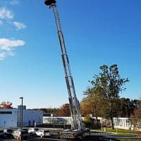 <p>Danbury firefighters loaned their ladder truck to the experiment.</p>