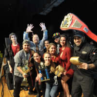 <p>The crew from Whistling Willie&#x27;s American Grill in Fishkill celebrates their win as king of the Hudson Valley Wingfest. The fest&#x27;s founder, Angelo Notero, is third from left, with his hands in the air.</p>