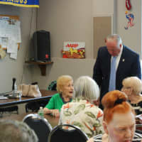 <p>Mayor Robert White talks with some of the seniors</p>