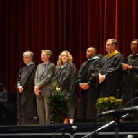 <p>White Plains educators take part in the high school&#x27;s 119th graduation exercises at the County Center Saturday.</p>