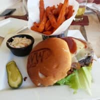 <p>The Red Eye Burger at Whistling Willie&#x27;s is rubbed with coffee and drowned in Wild Turkey honey barbecue sauce.</p>