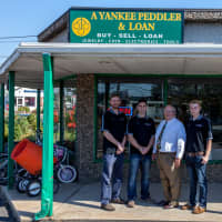 <p>A Yankee Peddler &amp; Loan in Norwalk is celebrating its third anniversary by sending its employees to school.</p>