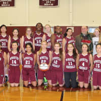 <p>Coach Dave MacNutt with his girls varsity basketball team at the Wooster School in Danbury.</p>