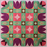 <p>Carolina Asmussen of Wilton designed this quilt, called Amsterdam View. It is the finalist in an international competition later this year in Houston.</p>