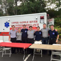 <p>Arman Fardenesh, second from right, and other young Upper Saddle River Volunteer Ambulance Corps members.</p>