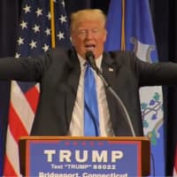 <p>Donald Trump gestures during his speech to a packed crowd Saturday at the Klein in Bridgeport.</p>