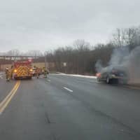 <p>The Brookfield Volunteer Fire Department respond early Tuesday to a car fire.</p>