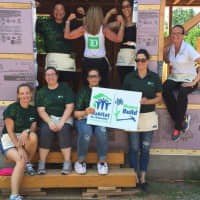 <p>TD Bank&#x27;s Power of Women team at work in Bergenfield for Habitat for Humanity of Bergen County.</p>