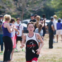 <p>Bart Codd of the New Canaan Blazers pulls away from the pack during a race earlier this year. </p>
