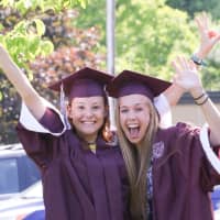 <p>Bethel High School seniors Gwen Gallagher and Casey Conway excitedly await their march through the elementary schools.</p>