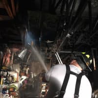 <p>Firefighters in Bethel were able to put out a garage fire before it spread to the attached house on Thursday night.</p>