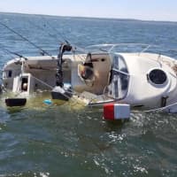<p>No one was injured when this boat sank in less than five minutes, according to Greenwich police.</p>