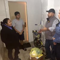 <p>The Bogota Police Thanksgiving delivery squad arrives.</p>