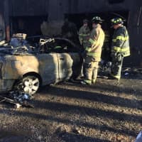 <p>A car was destroyed in a garage fire on Fir Tree Lane in Newtown on Sunday</p>